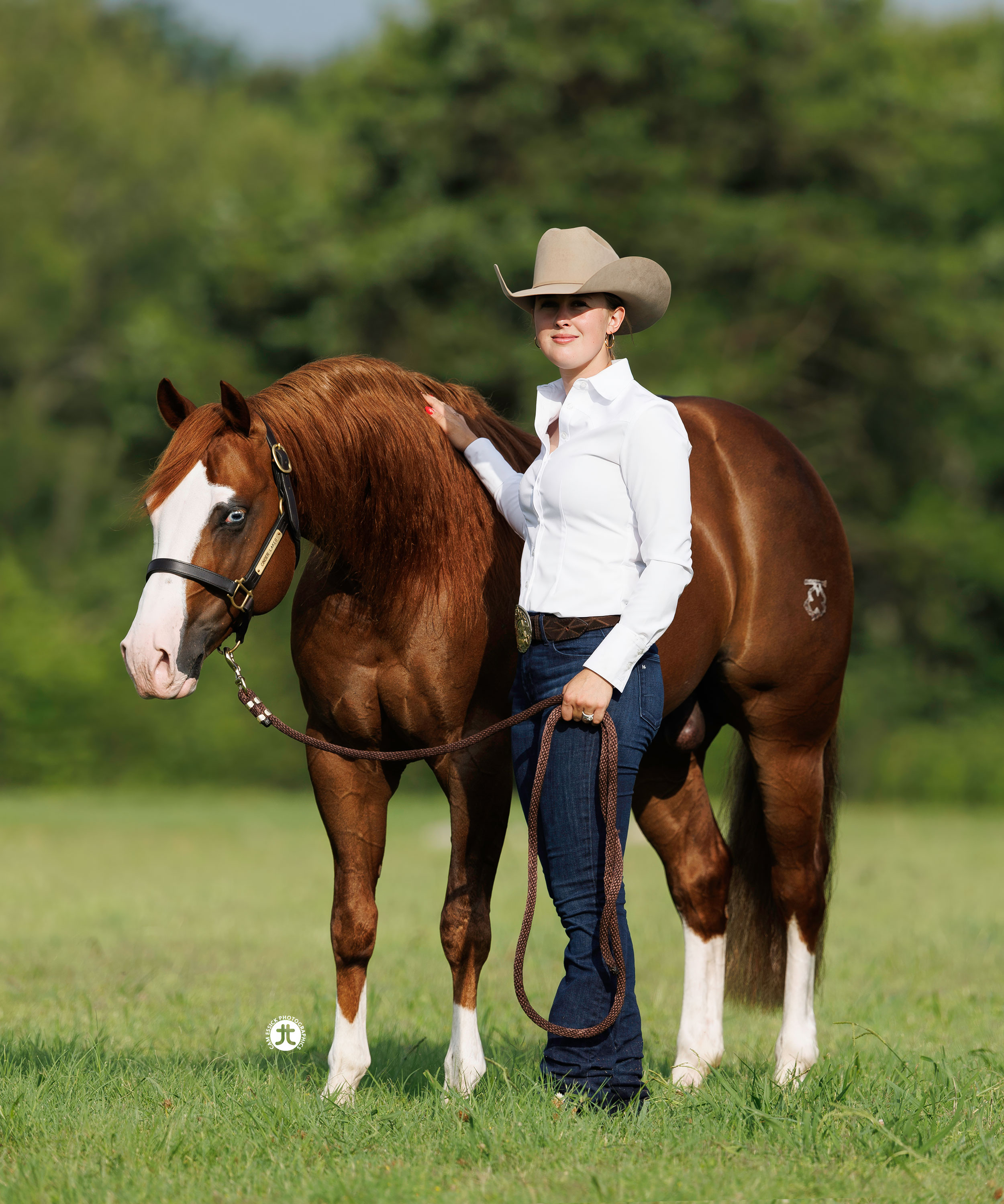 Gina Schumacher with a chestnut horse at CS Ranch