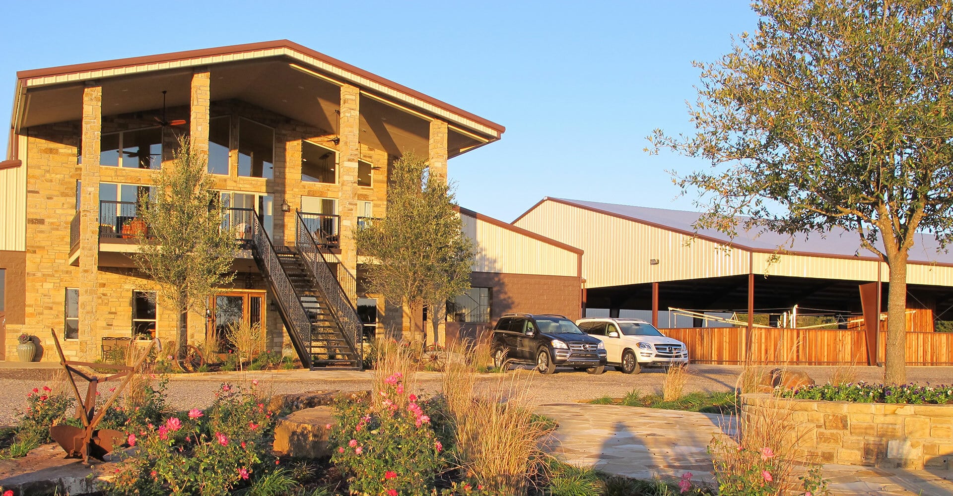The main building and barns at CS Ranch in Gordonville, Texas