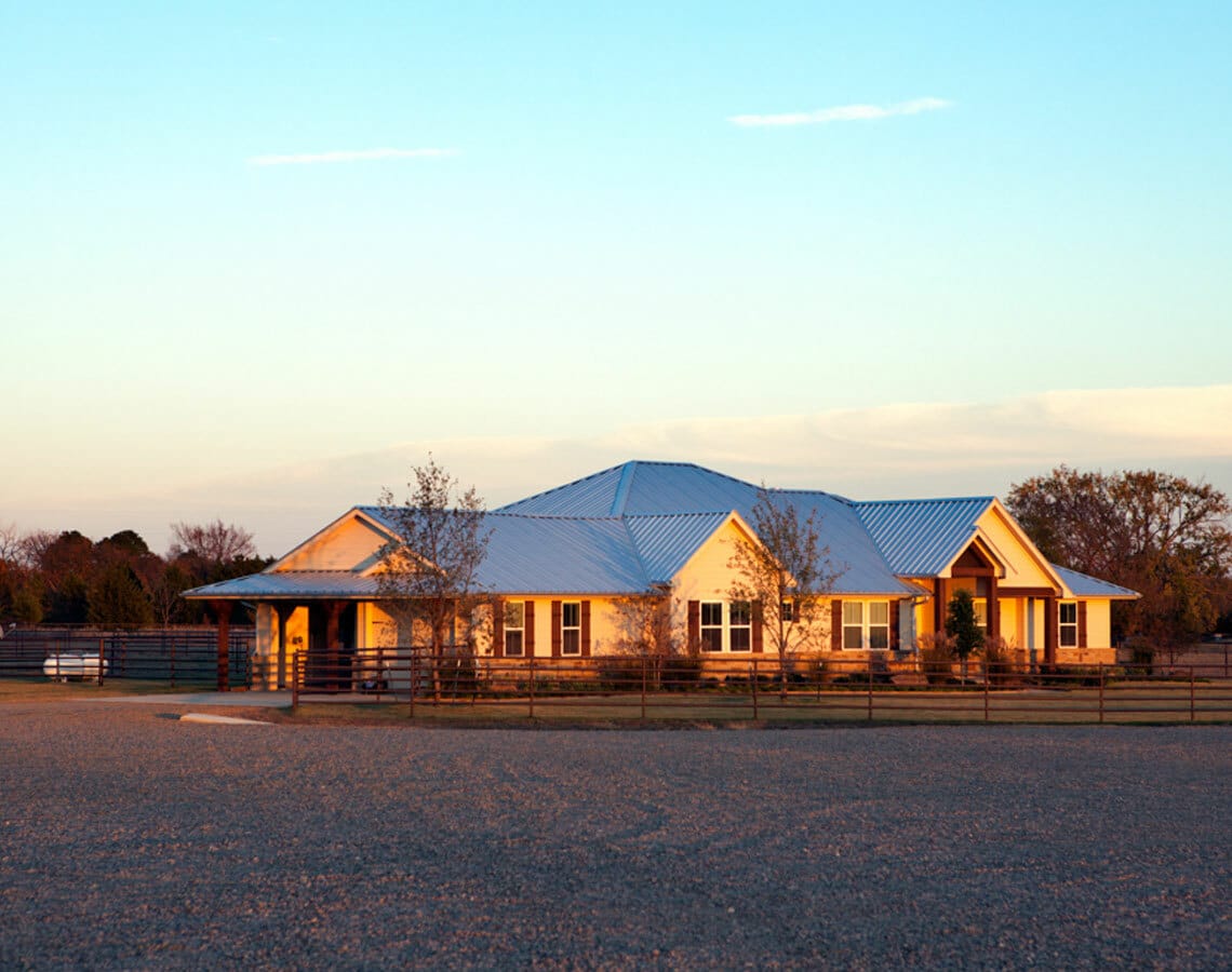 The ranch house at CS Ranch Texas at sunset